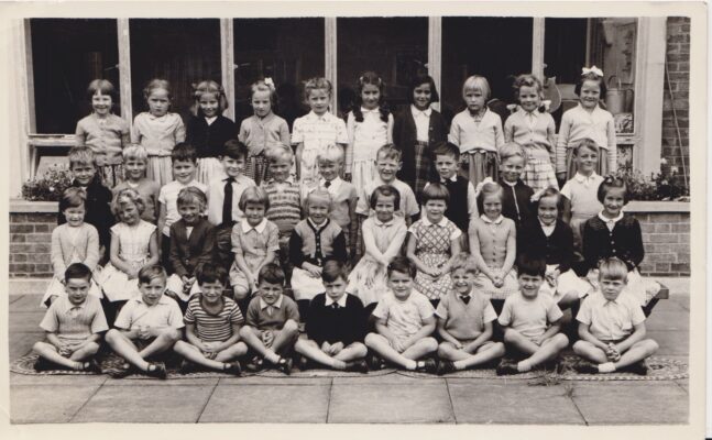 Black and white photograph of class at Holtspur School. | Unknown