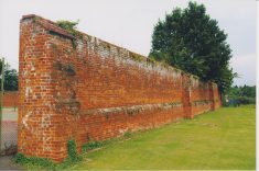 Photograph of high brick walls at Wilton Park